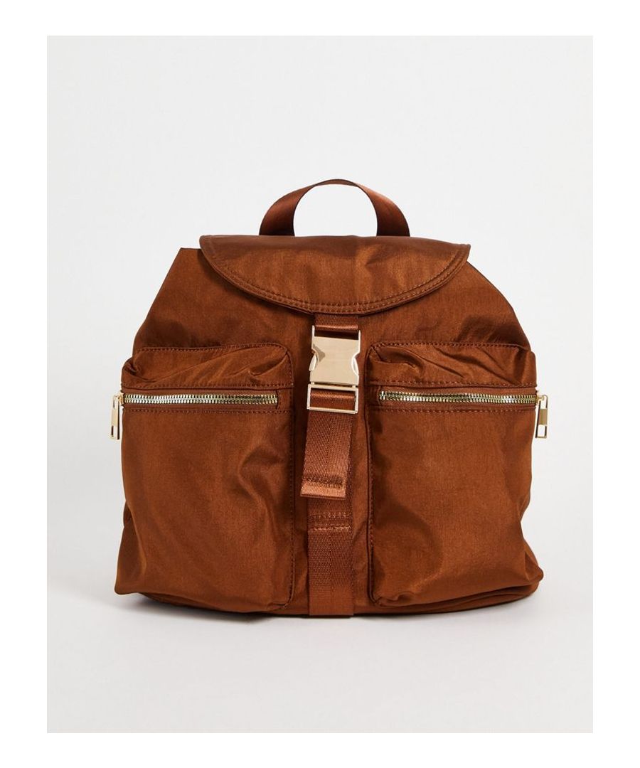Backpack by ASOS DESIGN Pack it up Grab handle Adjustable straps Fold-over flap top Secure buckle fastening Zip fastening External pockets Sold By: Asos