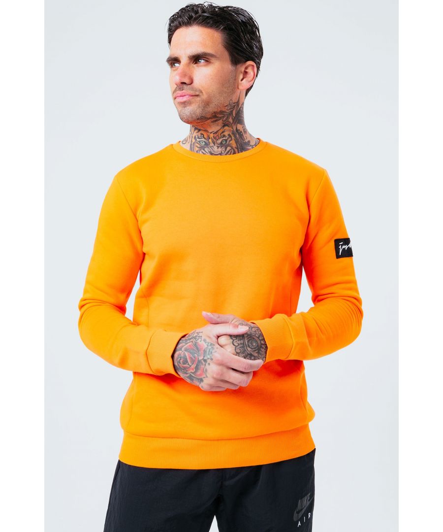 Introducing the HYPE. Orange Oversized Men's Crewneck Jumper. Designed in a bright orange colour palette in a 80% cotton and 20% polyester fabric base for supreme comfort and breathable space. With a crew neckline, long sleeves and fitted hem and cuffs in our oversized men's jumper shape. Finished with the new! justhype signature logo embroidered on the sleeve and seem panelling. Wear with the matching joggers to complete the look. Machine washable.