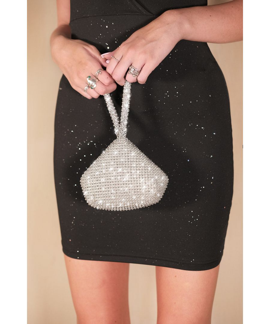 Keep all your night out essentials safe in our mini pouch Bag. An elegant, timeless piece that will match with most, if not all outfits. This diamante bag features a chainmail strap. You will be sure to get plenty of compliments with this bang on trend Clutch Bag