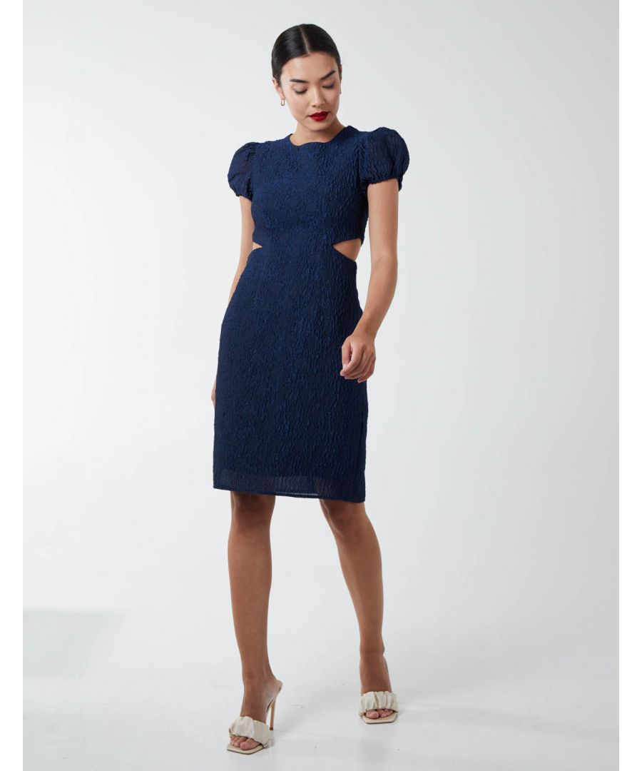 A wardrobe stunner, this dress with side cut out detail is perfect for looking glamorous on any occasion. Accessorize with fine jewellery and heels for off duty look.