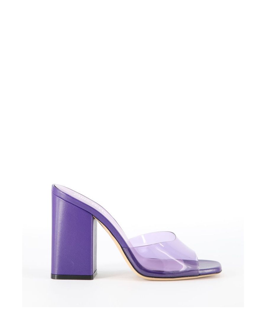 Anja mules in violet leather with a transparent PVC upper. They feature open toe, high and square heel and Paris Texas logo engraved on the insole. Heel height: 10cm