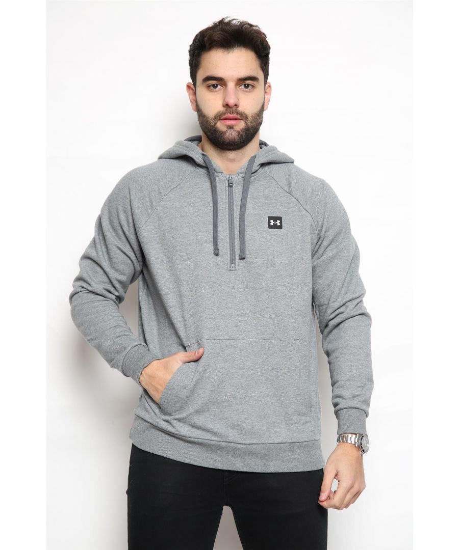 Under Armour Mens ½ Zip Rival Fleece Hoodie.     \nComing in a Fresh Grey Light Heather Colourway.     \nThese Fleeces Are Made with Smooth, Brushed Soft Cotton Blend Fabric.     \nClassic UA Branding on the Chest.     \nThey Feature ½ Zip & Front Kangaroo Pocket.     \nRibbed Cuffs & Bottom Hem.     \n80% Cotton, 20% Polyester.     \nMachine Washable.