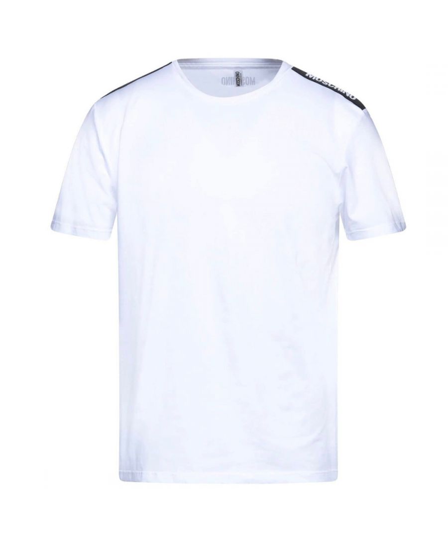 Moschino Brand Tape Logo White T-Shirt. Moschino Brand Tape Logo White Tee. Branding Tape Along The Shoulders. 93% Cotton, 7% Elastane, Made In Italy. Elasticated Crew Neck, Moschino Lounge Wear Collection. Product Code - A1931 8136 0001