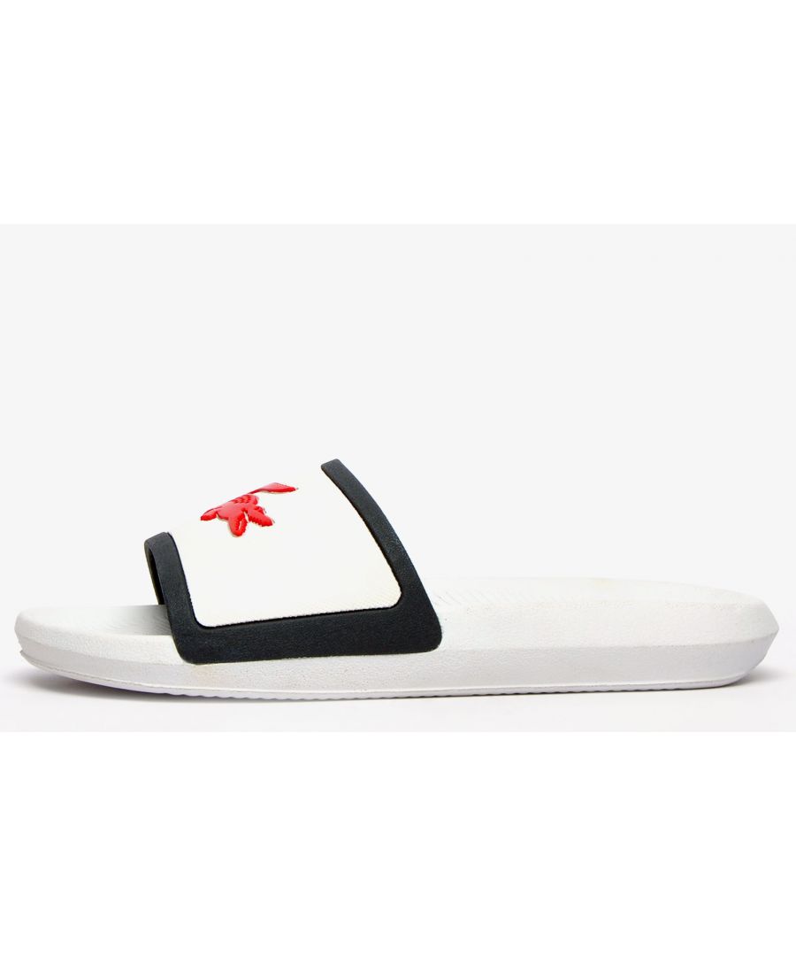 Head to the beach in style with these mens Lacoste Croco Slides. These on-trend sandals are crafted with comfort in mind whilst boasting a great water resistant super comfy footbed for a great fit and feel for the pool side and everyday wear. These designer slides are finished with eye catching Lacoste branding throughout just in case you want a sign of approval that youre wearing cool on trend style this summer season\n \n - On trend synthetic upper\n - Comfort moulded footbed\n - Grippy outsole\n - Slip on wear\n - Iconic Lacoste branding throughout\n Please Note: These slides are supplied poly bagged (without box)\n These Lacoste Slides are sold as B grades which means there may be some very slight cosmetic issues on the shoe and they come in a poly bag. There could be occasional issues with wrong swing tags being allocated to wrong shoes by Lacoste themselves which could result in some size confusion but you must take the size IN THE SHOE as the size that the shoe actually is ( not what is on the tag ). We have checked most of the shoes and in our opinion,all are practically perfect without any blemishes on them at all and in essence if the shoes did not have the letter B denoted on the swing tag you would presume these were perfect shoes. All shoes are guaranteed against fair wear and tear and offer a substantial saving against the normal high street price. The overall function or performance of the shoe will not be affected by any minor cosmetic issues. B Grades are original authentic products released by the brand manufacturer with their approval at greatly reduced prices. If you are unhappy with your purchase, we will be more than happy to take the shoes back from you and issue a full refund