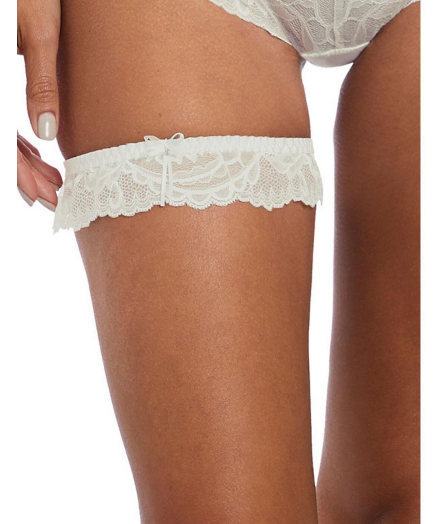 This garter is part of the Bronte collection by Fantasie. The elegant design is made from stretch lace and has an elastic band to fit comfortably. It features a bow that has a diamante trim. An ultra-feminine piece that is perfect for your special day.\n\nElegant garter\nStretch lace\nElastic band for a comfortable fit\nBow with diamante trim\nFeminine design\nComposition: 77% Nylon/Polyamide | 23% Elastane\n\nListed in UK sizes