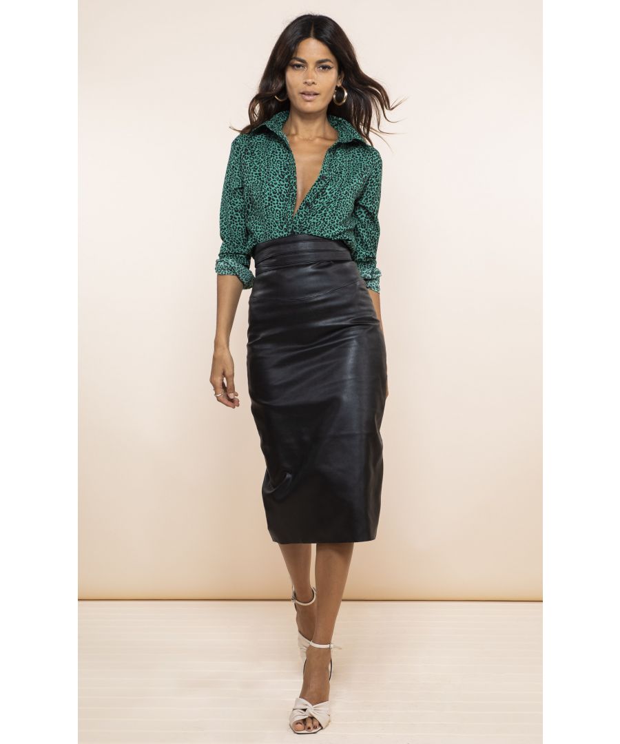 Midi length faux leather skirt. Belt not included