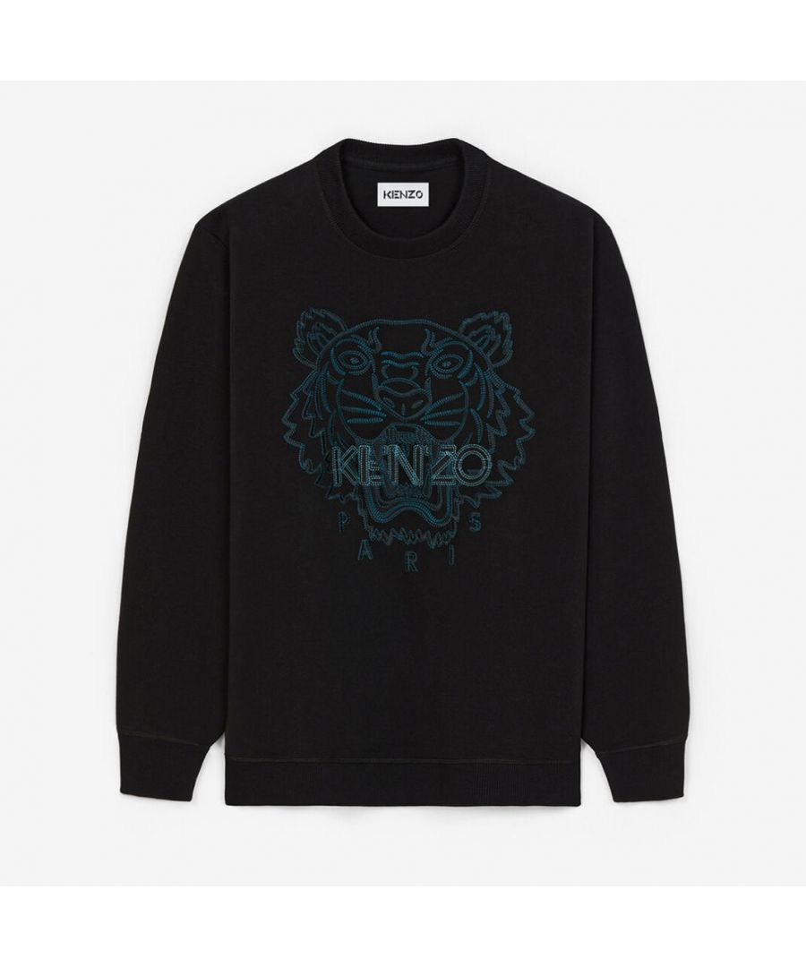 A must-have in any casual-chic wardrobe, this sweatshirt features a classic cut and is embroidered with the iconic KENZO Tiger on the front. The rib-knit collar, cuffs and hem ensure a perfect fit. This soft, comfortable, practical piece elevates any modern masculine look. Organic cotton sweatshirt. Long sleeves. Round neck. Tiger embroidered on the front.