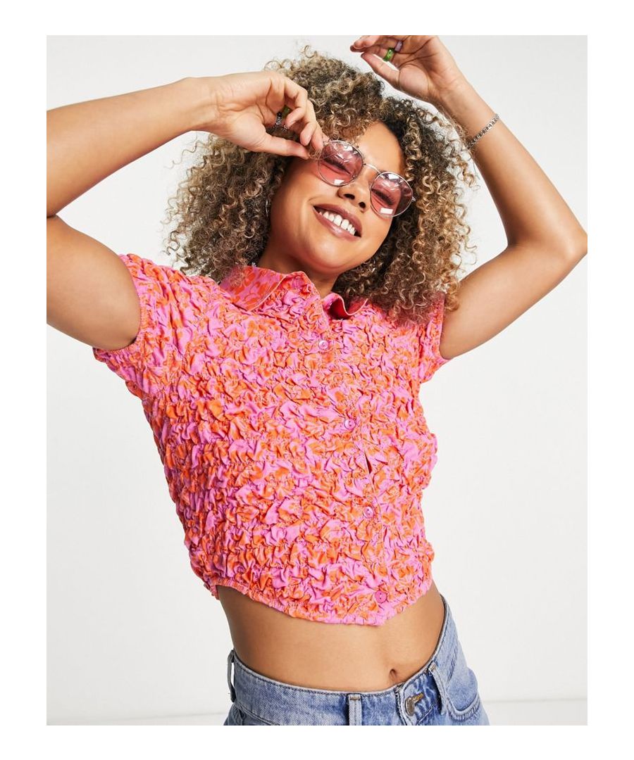 Shirt by COLLUSION Exclusive to ASOS Shirred design Floral print Spread collar Button placket Short sleeves Cropped length Slim fit  Sold By: Asos