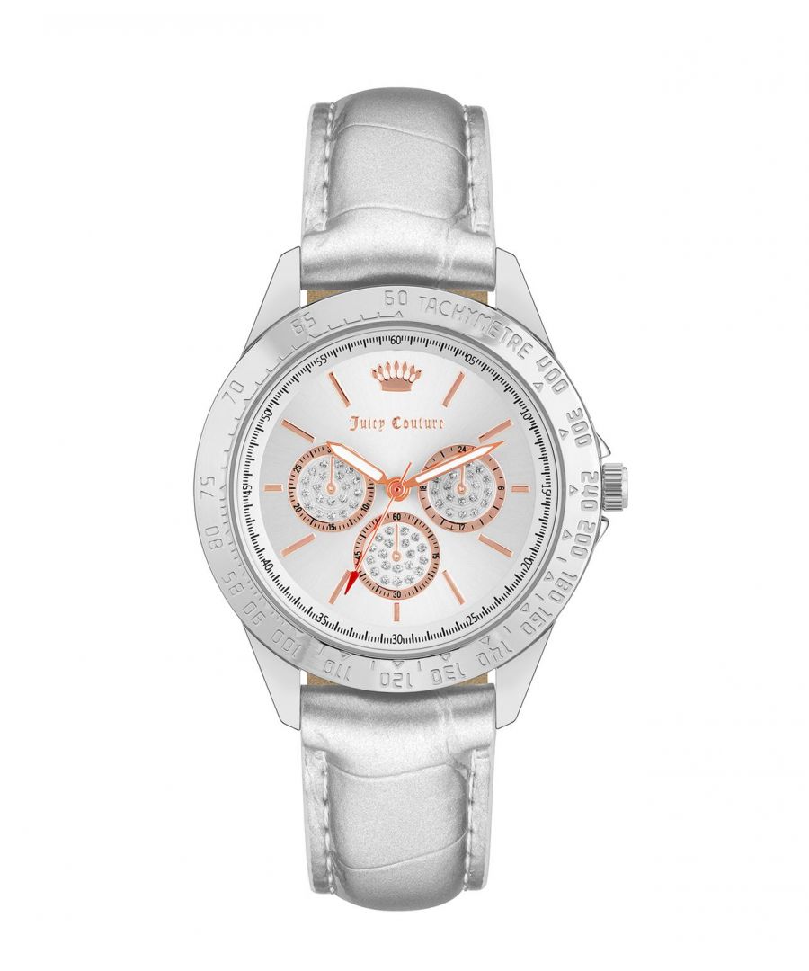 Juicy Couture Watch JC/1221SVSI\nGender: Women\nMain color: Silver\nClockwork: Quartz: Battery\nDisplay format: Analog\nWater resistance: 0 ATM\nClosure: Pin Buckle\nFunctions: No Extra Function\nCase color: Silver\nCase material: Metal\nCase width: 38\nCase length: 38\nFacing: Rhine Stone\nWristband color: Silver\nWristband material: Leatherette\nStrap connecting width: 18\nWrist circumference (max.): 23.3\nShipment includes: Watch box\nStyle: Fashion\nCase height: 9\nGlass: Mineral Glass\nDisplay color: Silver\nPower reserve: No automatic\nbezel: none\nWatches Extra: None