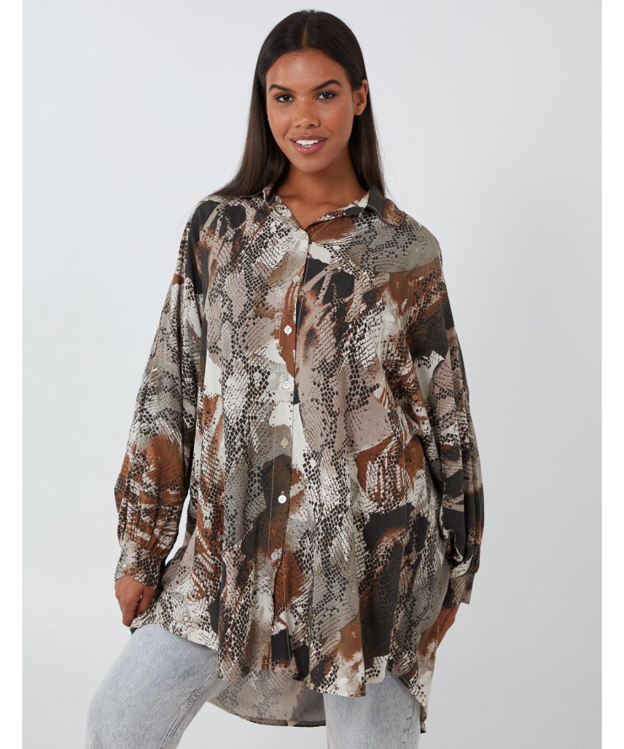 This shirt is an absolute must have this season! Featuring soft fabrics, snake print and oversized fit will give you unique look wherever you are. Add sneakers and skinny jeans for out of duty look! 100% Viscose Machine washable Collared neckline Long Sleeve Approx length 88 cmThis item is a ONE size that fits UK 8-14