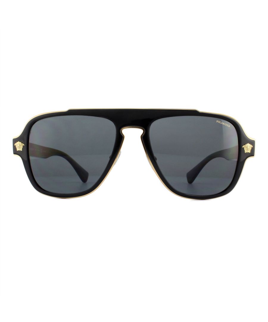 Versace Sunglasses VE2199 100281 Black Grey Polarized are square shaped aviator style sunglasses. The flat frame front features a metal outer edge and iconic Medusa head logos on each of the corners. The acetate temples showcase the Versace text logo too. Adjustable nose pads ensure a comfortable fit and the keyhole bridge provides a distinctive look.
