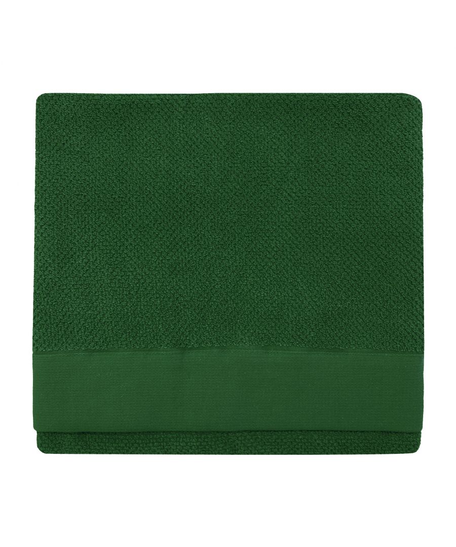 Accessorise your bathroom with the simplistic yet chic textured bath towel. Made from 100% Cotton, this design features an Oxford panel trim and is also quick-drying and super absorbent. This product is certified by OEKO-TEX® showing it has been sustainably made.