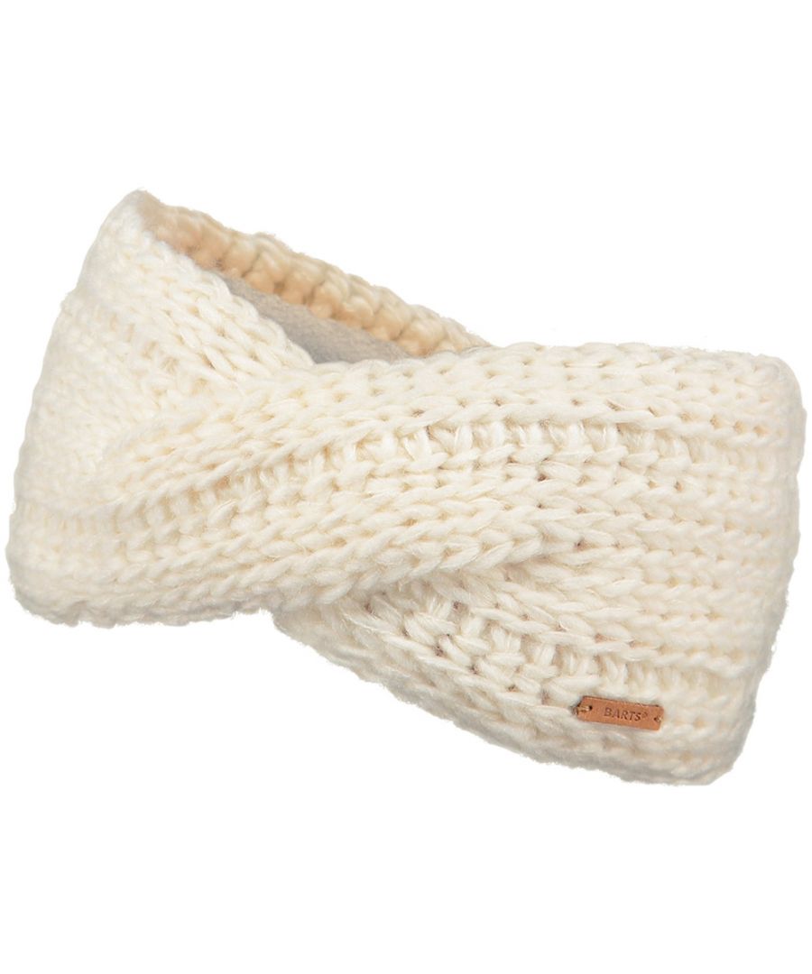 The Jasmin Headband is a hand knitted headband with a rib pattern. It has a twist at the front and is lined with fleece for extra comfort.