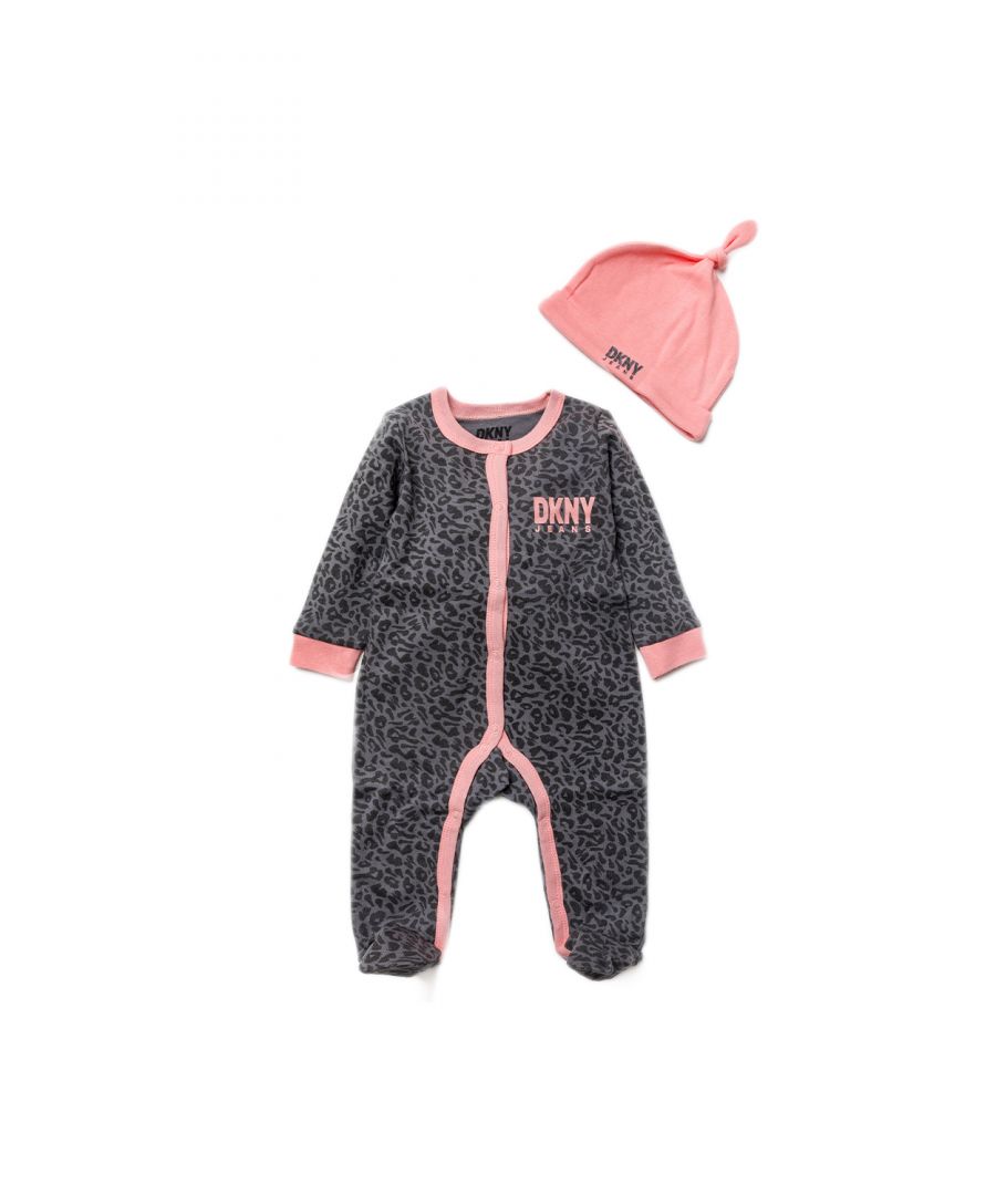 This adorable DKNY Jeans two-piece set includes a printed sleepsuit, and a matching hat with the DKNY Jeans logo. The set is cotton, with popper fastenings, keeping your little one comfortable. This would make a sweet gift for the little one in your life!