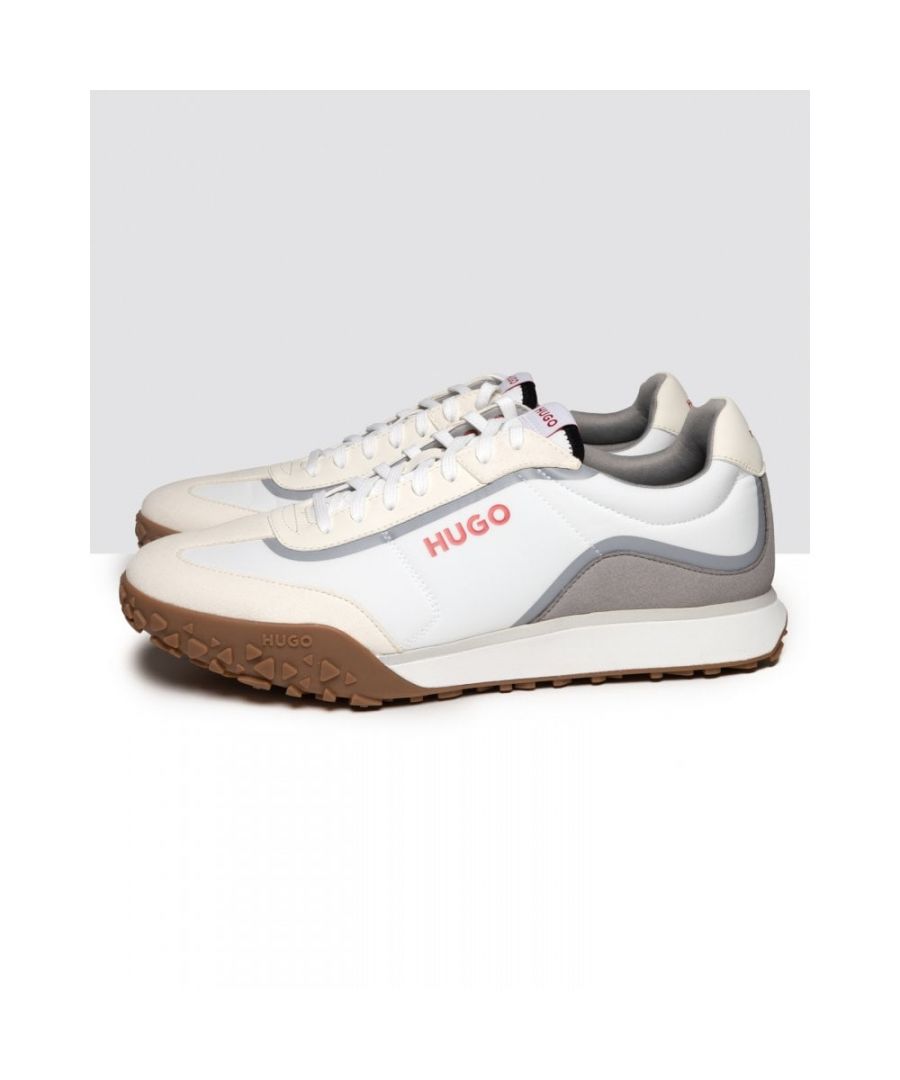 Fresh trainers with a low profile by HUGO. Featuring HUGO branding for a distinctive look, these sporty trainers are crafted in a combination of materials with microfibre wingtips. The EVA-rubber outsole has a retro-inspired design for typical creativity.\nLacesFully linedPackaging: Box\nUpper material: 100% Polyester, 100% Polyester, Sole: 60% Ethylene vinyl acetate, 40% Rubber, Facing: 100% Polyurethane, 100% Polyester, Innersole: 100% Polyester\n50480970