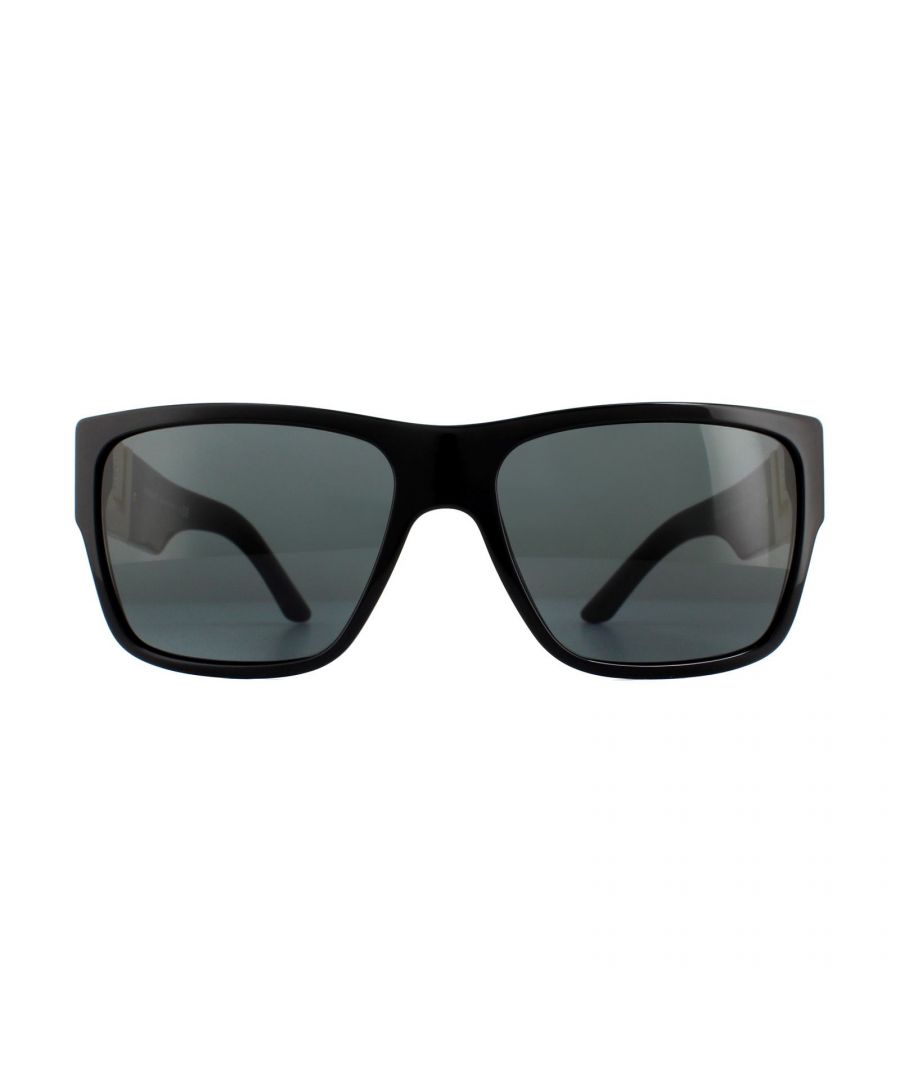 Versace Sunglasses VE4296 GB1/87 Black Grey are a bold square shape that features a sculpted metal Versace Greca logo at the hinges. The large metal logo contrasts perfectly against the acetate frame and creates an edgy look.