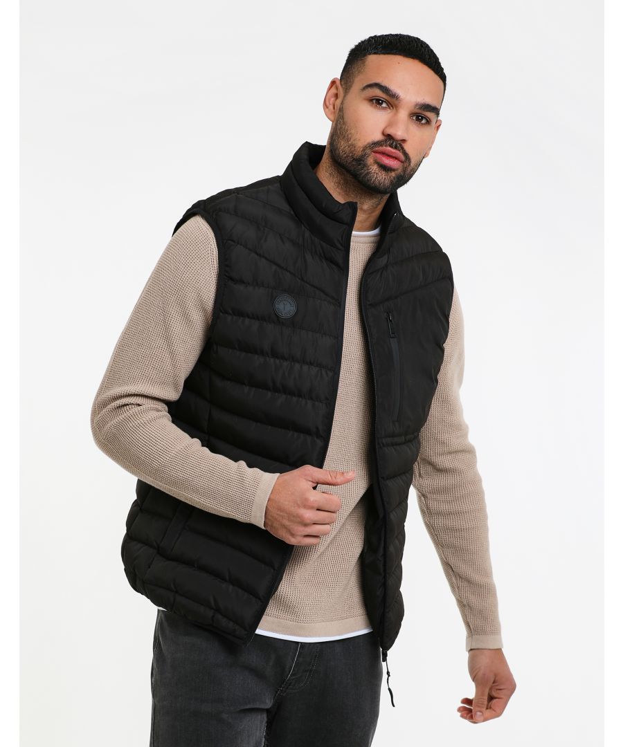 This lightweight padded gilet from Threadbare features a zip fastening pocket on the chest, two open side pockets and a rubber brand logo on the chest. This style is ideal for layering. A range of other colours and similar styles are available.