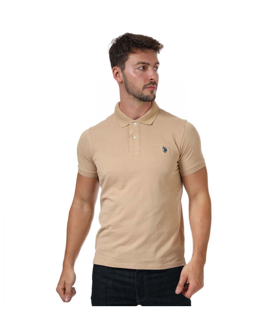 Mens US Polo Assn Pique Polo Shirt in beige.- Button down collar.- Short sleeves.- Two button placket.- Featuring the embroidered double horsemen for the USPA stamp of authenticity.- Ribbed cuffs.- 100% Cotton. - Ref: 63515221