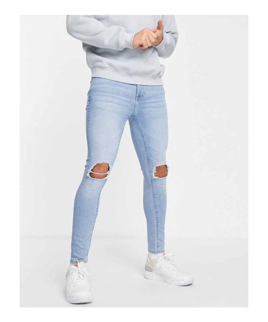 Super-skinny jeans by ASOS DESIGN It's all in the jeans Super-skinny fit Regular rise Belt loops Five pockets Ripped knees Sold by Asos