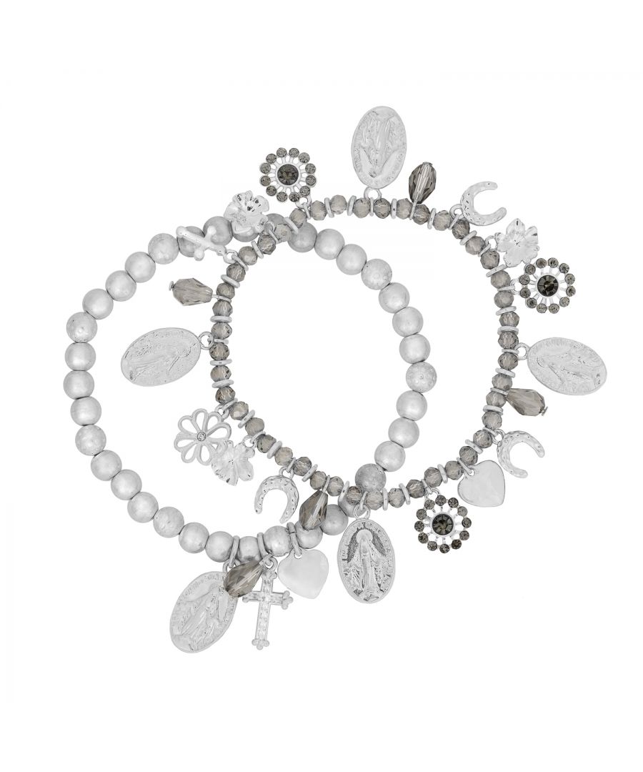 Slay spring in this adorable silver plated charm bracelet set! Dress your wrist up and add some sparkle to your outfit with this celestial inspired bracelet duo adorned with charming charms that include a celestial cross, horseshoe and miniature heart charms making it an eye catching addition to any arm candy collection! This is a beautiful silver tone plated bracelet set that's great worn alone or stacked with your other favourite bracelets - that's why it's called Bibi Bijoux Lucky Charm Bracelet Set! A set of two separate stretch bracelets both 7.5 inch in circumference with reinforced silicone elastic for ease of wear. Presented in a BB pouch to keep safe or for perfect gifting!