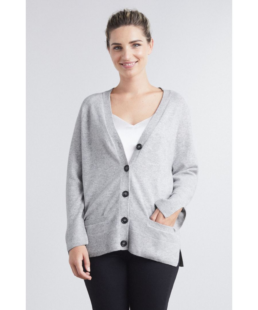 Our relaxed v neck cardigan has been given a make over. Just the right side of relaxed with statement buttons, pockets and deep rib trims the sleeves are slimmer and the body slightly longer for a versatile and flattering addition to your wardrobe. Layers beautifully over a silk cami, looks smart over a shirt or layer with cashmere joggers for a relaxed downtime look.