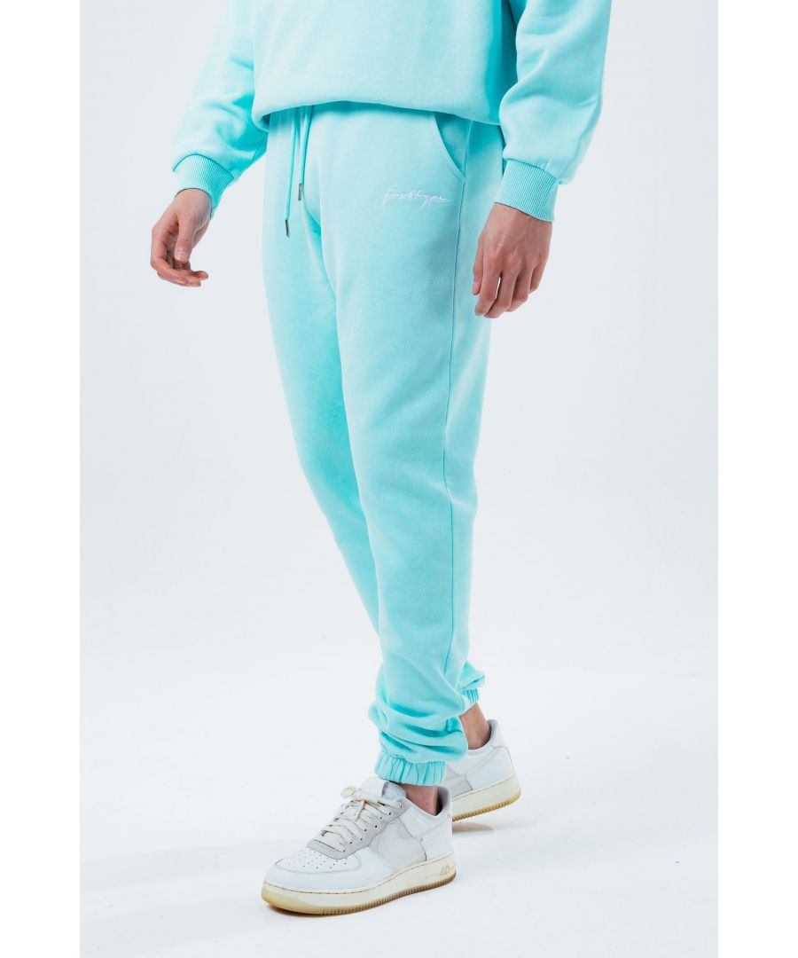 The HYPE. Teal Vintage Men's Baggy fit joggers are your go-to summer staple. Designed in the perfect fabric for the ultimate comfort. With drawstring pullers, an elasticated waistband and a baggy silhouette creating an on-trend style. Compliment by a block teal colour palette. Finished with the signature just hype logo embroidered on the side contrasting white. Machine washable.