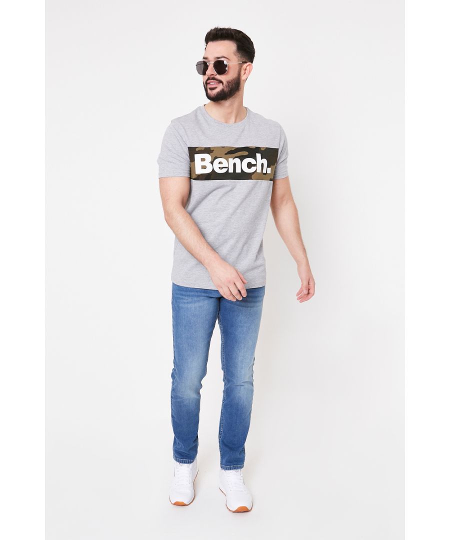 The ‘Sendak’ tee from Bench is the perfect addition to any casual outfit. This comfortable cotton T-Shirt features a bold camo print detail across the chest showcasing the iconic Bench logo. Style with either jeans or your favourite joggers for the perfect fit.