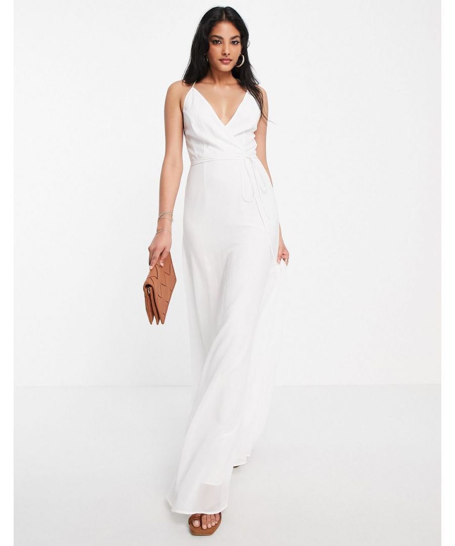 Maxi dress by ASOS DESIGN All dressed up Plunge, wrap front Sleeveless style Wraparound, tie waist Crossover, strappy back Zip-back fastening Regular fit Sold by Asos