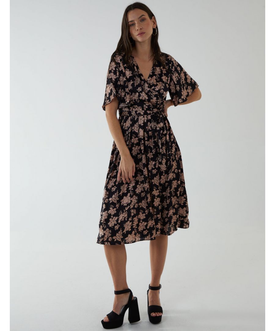 You will never go wrong with the V-Neck Angel Sleeve Midi Dress. Polka dots, a waist belt, angel sleeves and a wrap front are all elements that make this dress ideal to wear on a lunch date with family or when having a city break. Style with heel shoes.