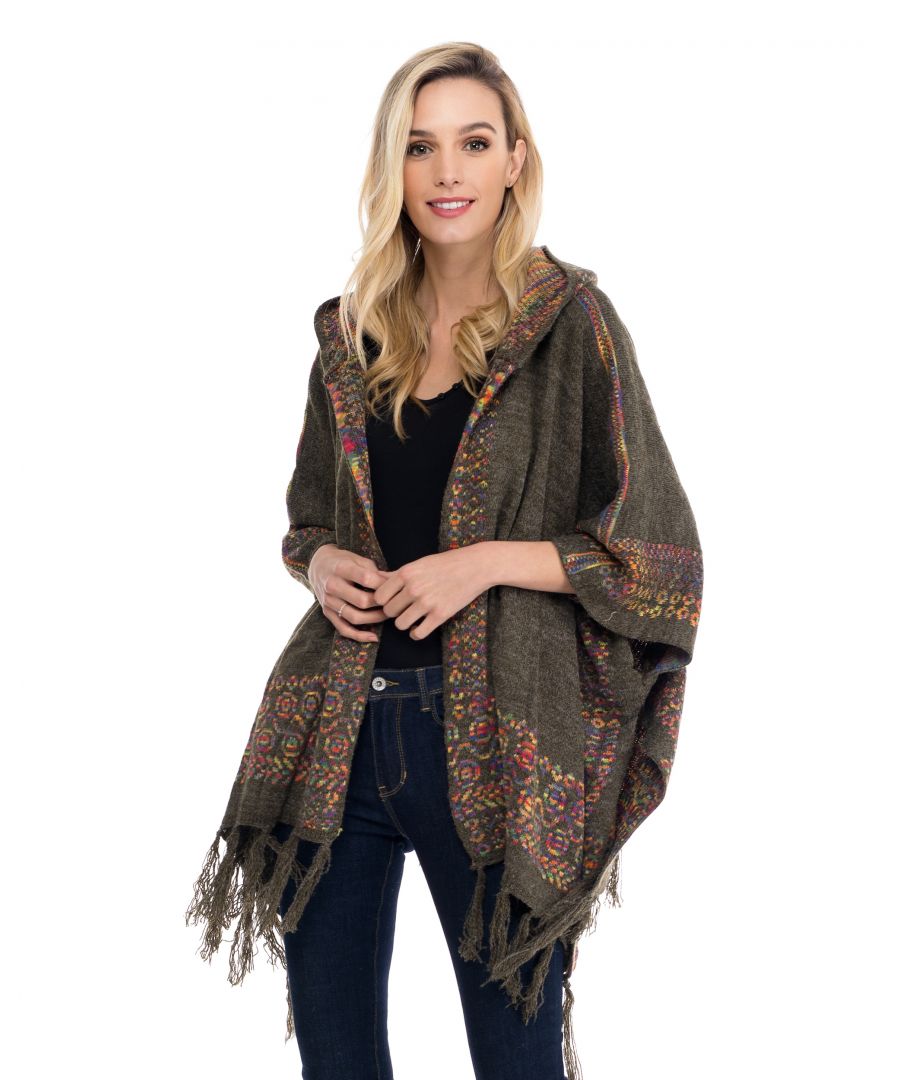 Knitted graphic poncho with hood and tassels