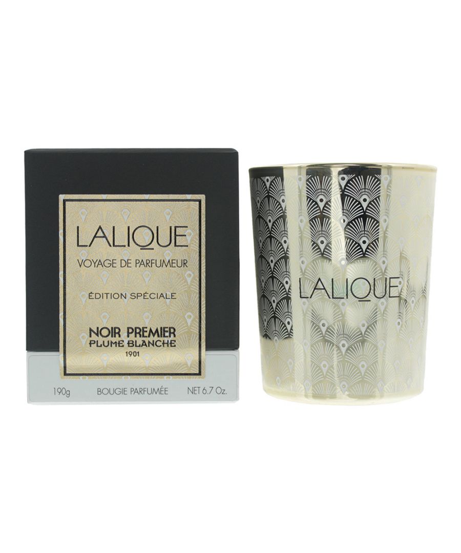 Lalique Noir Premier Plume Blanche Candle is a candle inspired by the Peacock, and is part of the excellent Voyage de Parfumeur range of Lalique's. The candle was launched in 20202, and the fragrance of it has top notes of Mandarin and Violet Lead; middle notes of Almond Leaves, Cardamom, Jasmine and Pink Peppercorn; in the base of the fragrance are notes of Benzoin, Heliotrope, Musks, Patchouli, Tonka Bean and White Cedarwood. The candle has a burning time between 40 hours and 50 hours and comes in a gorgeous golden lacquered glass.