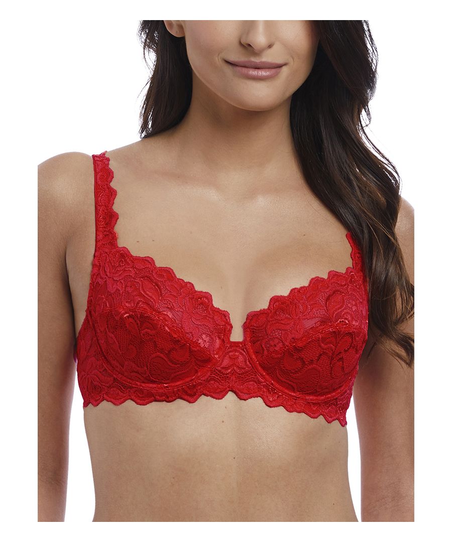 Wacoal Eglantine, this charming underwired balcony bra features transversal seams on the cups to provide a rounded shape to the bust and mesh sling side support panels are included inside the cups for forward projection of the bust for a flattering fit. The all-over stretch lace cups feature beautiful scalloped edges across the underbust and top cups and continue onto the straps for a stylish, chic touch. Complete with shine-effect side wings and adjustable satin straps.