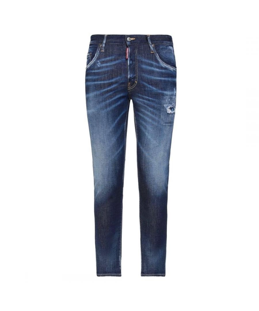 Dsquared2 Skater Jean Worn Effect Dark Blue Jeans. Dsquared2 Skater Jean S74LB0793 S30685 470. Stretch Denim 98% Cotton 2% Elastane. Button Fly, Made In Italy. Slim Fit With A Tapered Leg. Small Branded Badge on Fly ,Paint Splash Detail, Destroyed Reinforced Denim