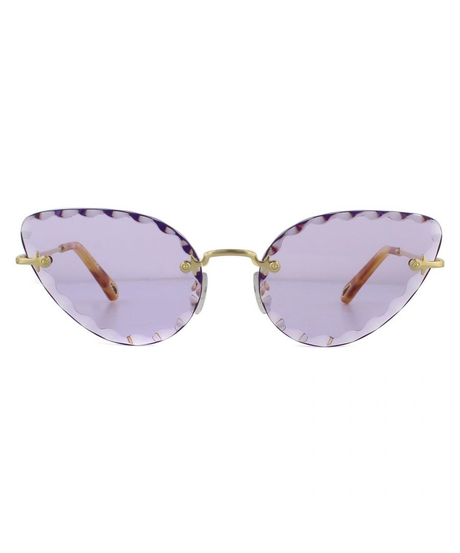 Chloe Sunglasses CE157S Rosie 852 Gold Purple Gradient Coral are a luxurious and feminine cat eye design with stunning scalloped edge rimless lenses. Thin metal temples are etched with a filigree pattern and Chloe logo.