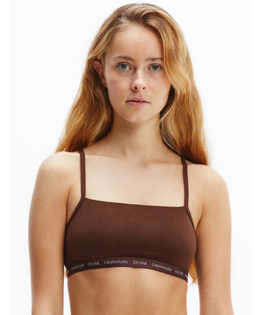 The iconic CK One Cotton lingerie series by Calvin Klein offers premium everyday lingerie in a timeless athleisure style. This pack of 2 bralettes are unlined and non-wired for a comfortable all-day fit. This classic pull-on design with signature logo underband add a designer finish to the minimal string design. Complete the sports-luxe look with coordinating lingerie available from the CK One Cotton collection by Calvin Klein.\n\nSignature logo underband\n2-pack bralettes\nSporty square neckline\nPull-on design\nAdjustable string style straps\nUnlined and non-padded\nNon-wired\nComposition: 55% Cotton | 37% Modal | 8% Elastane\nListed in UK sizes