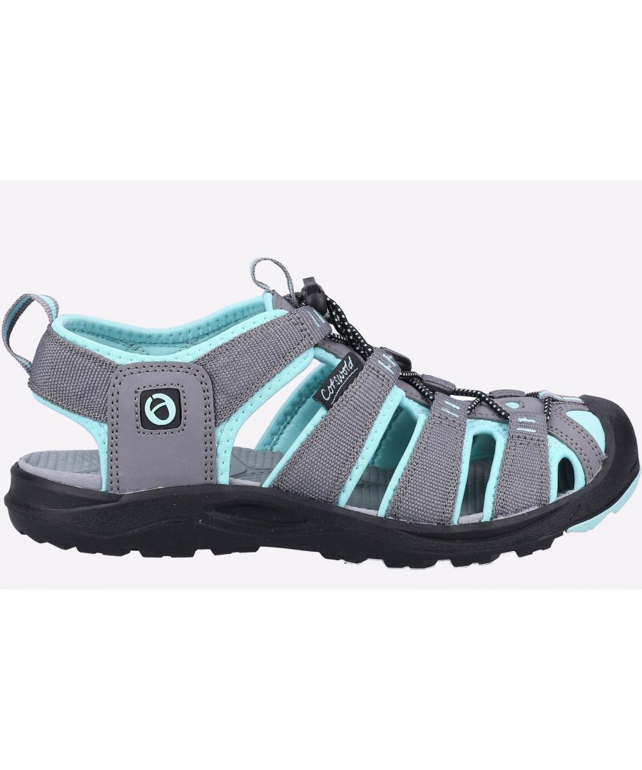 Ladies summer walking leisure sandal from Cotswold, Marshfield Ladies is crafted with lightweight recycled uppers, it has a pull toggle fastening for a secure fit and sporty Rugged 360 traction sole for superior grip.\n- Recycled upper- Pull toggle fastening- Summer walking leisure sandal- Lightweight PU and Neoprene upper- Sporty Rugged 360 traction sole