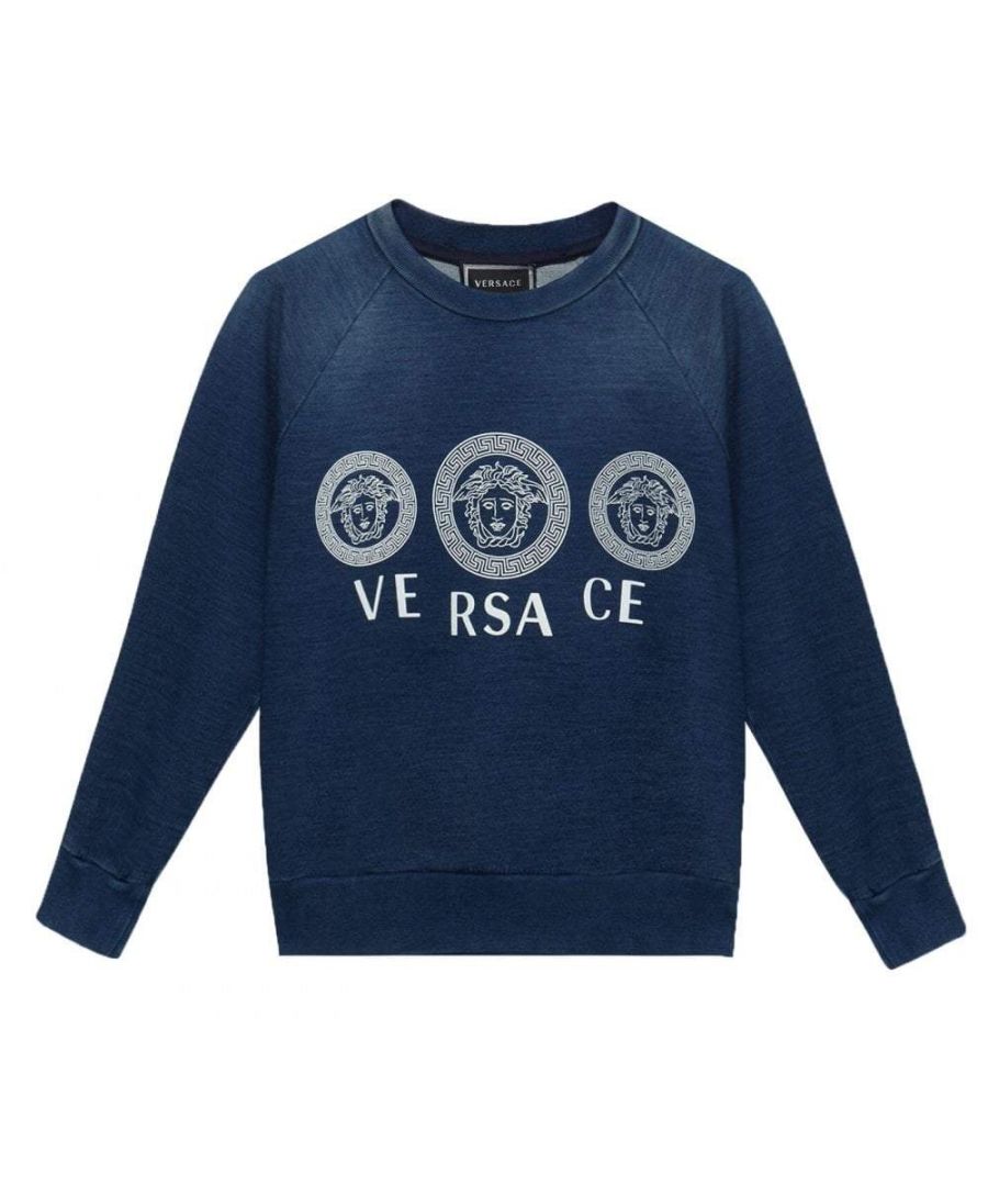 This washed blue sweater from Young Versace, features the triple medusa head logo on the front.