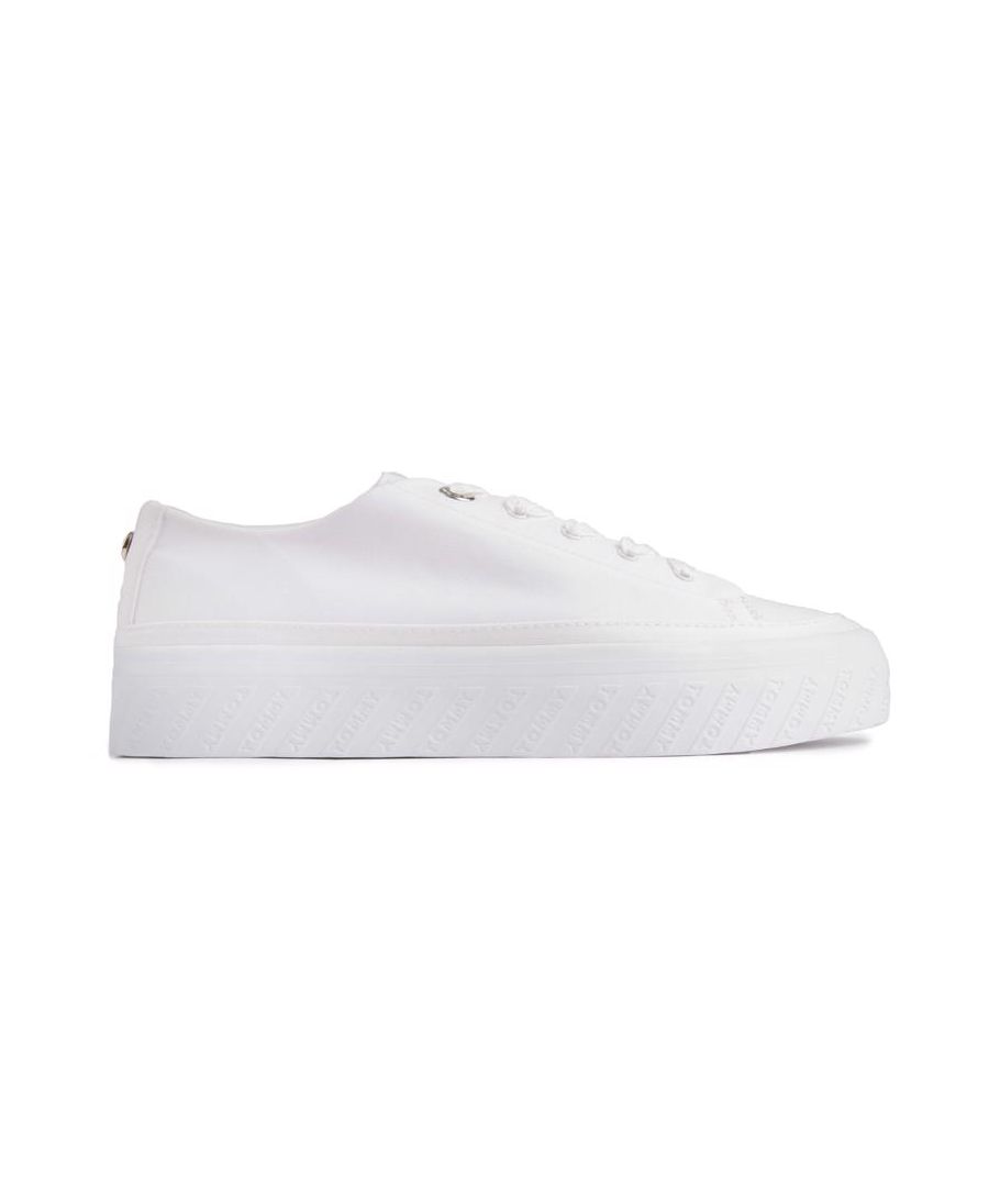 Womens white Tommy Hilfiger monochromatic trainers, manufactured with leather and a rubber sole. Featuring: monochrome design, silver hardware, platform sole and tommy hilfiger branding.