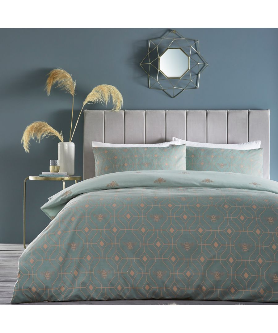 A subtly geometric honeycomb patterned duvet set, featuring buzzing bees on an eau du nil background, making it ideal for a neutral setting. The reversible design offers an alternative pattern to choose from. The choice is yours!