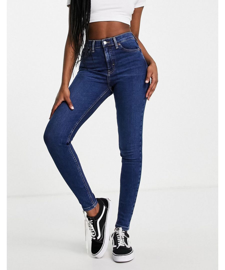 Jeans by Topshop Topshop’s iconic Jamie style Skinny fit High rise Belt loops Zip fly Five pockets Ankle-grazer length Tight cut, regular on the waist  Sold By: Asos