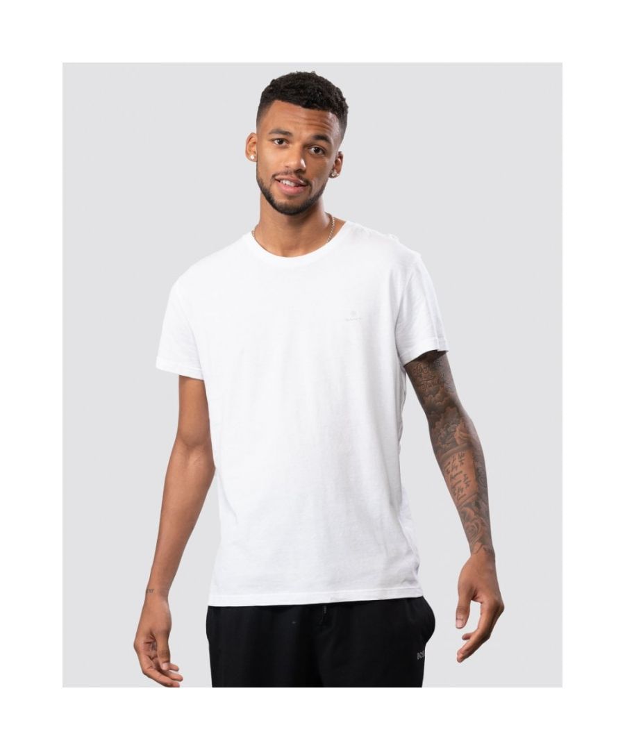 Our basic 2-Pack Crew Neck T-Shirts are crafted in 100% cotton, have short sleeves, a crew neck, and the GANT logo printed at the chest. A wardrobe essential for every man.\n\nRegular fit\nCrew neck\nGANT logo printed at chest\nCotton 100%