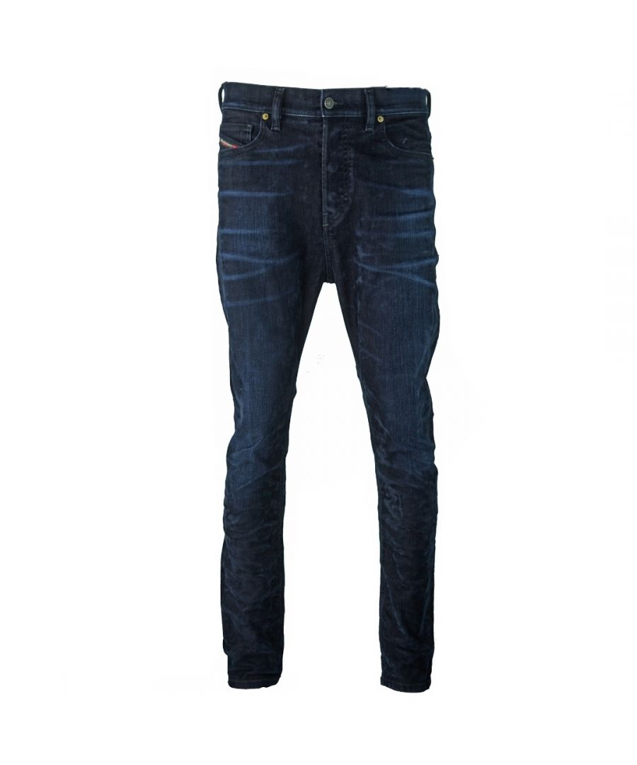 Diesel D-Vider 0091U spijkerbroek. Diesel D-Vider 0091U Carrot Fit-jeans. Normale taille, taps toelopende pijpen, knoopgulp. 88% katoen, 9% viscose, 3% elastaan ​​stretchdenim. Jeans met 5 zakken. Badge met het merk Diesel