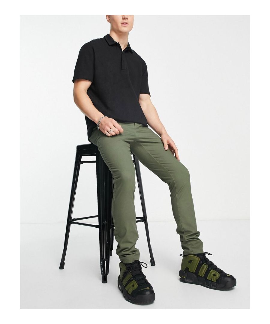 Chinos by ASOS DESIGN Waist-down dressing Regular rise Belt loops Functional pockets Super-skinny fit Sold by Asos