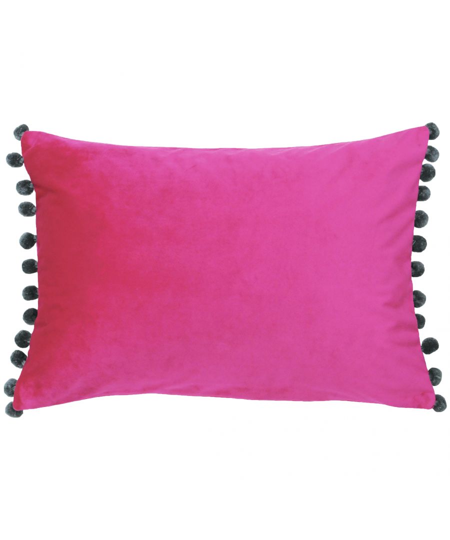 The name gives away this cushion’s greatest asset. The Fiesta cushion, aptly named after the Spanish word for festival, is a plethora of bright colours and mixed tones. The velvet body of the cushion is an absolute delight to touch thanks to its sublimely soft texture and catches the light from every angle. Contrasting coloured pompoms feature along the edges to further enhance the fun and tactile nature of this cushion. With a hidden zip closure nothing takes away from this cushions unique design. While this Polyester Filled Cushion is not machine washable due to its gorgeous pompoms it is iron appropriate.