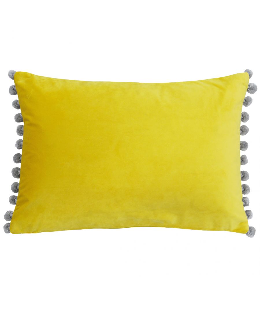 The name gives away this cushion’s greatest asset. The Fiesta cushion, aptly named after the Spanish word for festival, is a plethora of bright colours and mixed tones. The velvet body of the cushion is an absolute delight to touch thanks to its sublimely soft texture and catches the light from every angle. Contrasting coloured pompoms feature along the edges to further enhance the fun and tactile nature of this cushion. With a hidden zip closure nothing takes away from this cushions unique design. While this Polyester Filled Cushion is not machine washable due to its gorgeous pompoms it is iron appropriate.