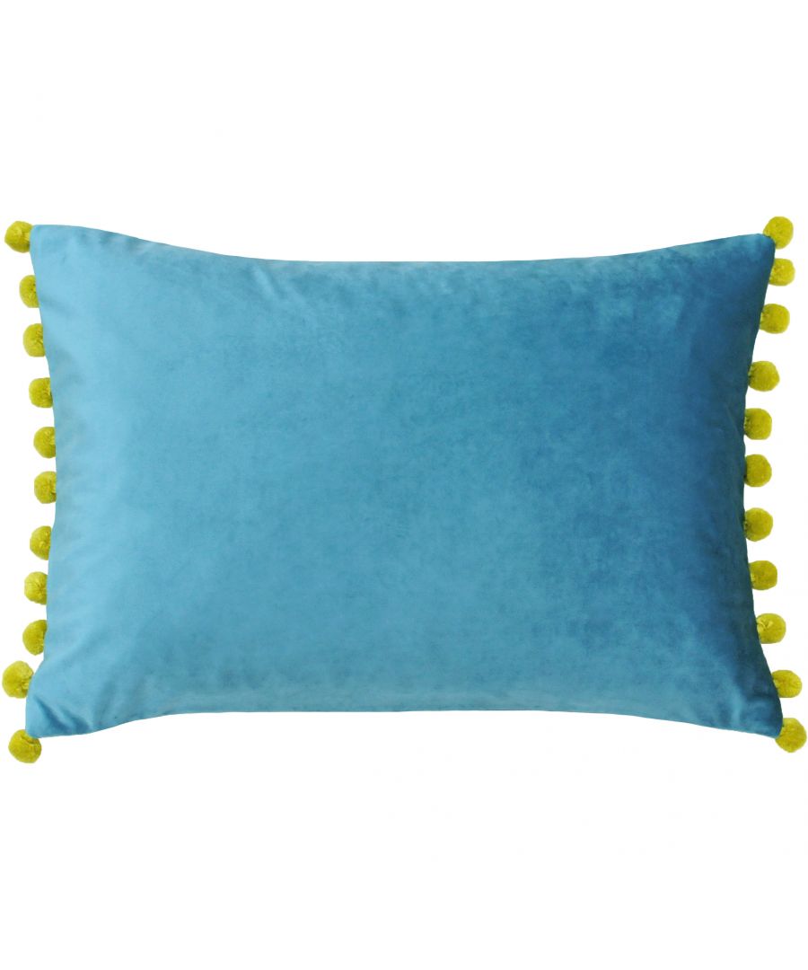 The name gives away this cushion’s greatest asset. The Fiesta cushion, aptly named after the Spanish word for festival, is a plethora of bright colours and mixed tones. The velvet body of the cushion is an absolute delight to touch thanks to its sublimely soft texture and catches the light from every angle. Contrasting coloured pompoms feature along the edges to further enhance the fun and tactile nature of this cushion. With a hidden zip closure nothing takes away from this cushions unique design. While this Polyester Filled Cushion is not machine washable due to its gorgeous pompoms it is iron appropriate.