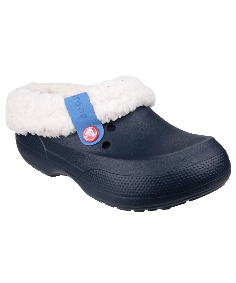 Kids have a funny way of bounding outside no matter what shoes happen to be on their feet. With the warm comfort of a slipper and the versatility of a shoe, these clogs let them go from cozy couch to backyard leaf pile and beyond.Plush, fuzzy liners keep toes toasty. \nLiners are fully removable and washable. \nWaterproof design is great indoors or out. \nDual Crocs Comfort deep cushion with all day support.
