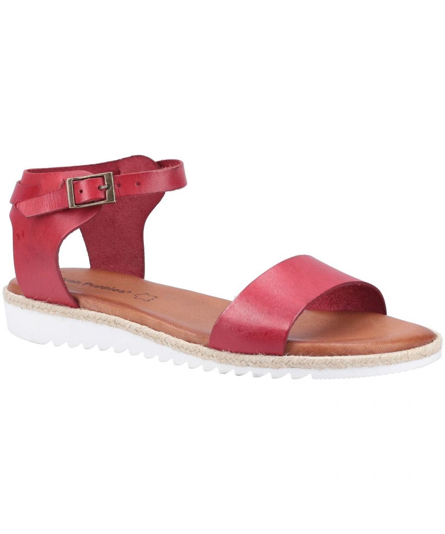Voeg een vleugje eigentijdse flair toe aan je garderobe met de veelzijdige Gina Flat sandaal.