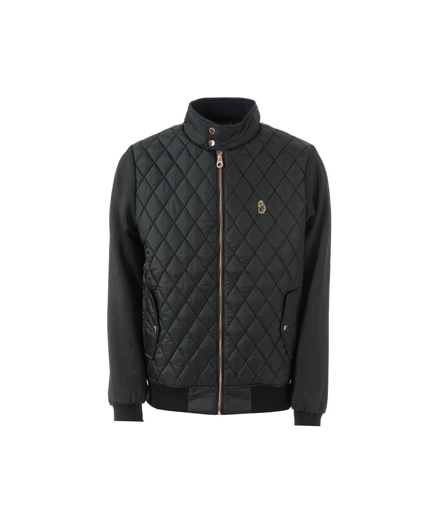 Mens Luke 1977 Lightning Rod Quilted Jacket in black.<BR><BR>- Stand up collar with snap closure.<BR>- Exposed zip fastening.<BR>- Long sleeves.<BR>- Diamond quilted body.<BR>- Side flap pockets with snap closure.<BR>- Inner slip pocket.<BR>- Ribbed inner collar  cuffs and hem.<BR>- Embroidered Lion crest logo at left chest.<BR>- Fully lined.<BR>- Body: 100% Nylon.  Sleeves: 95% Polyester  5% Elastane.  Lining: 100% Polyester.  Wadding: 100% Polyester.  Machine washable.<BR>- Ref: M560714