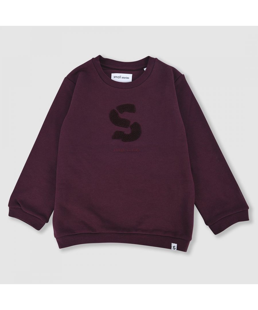 Classic crew neck sweatshirt in deep burgundy featuring our bespoke S monogram in towelling with subtle Small Stories embroidery. Made in 100% super soft cotton with comfy brushed fleece interior. Designed to be unisex.
